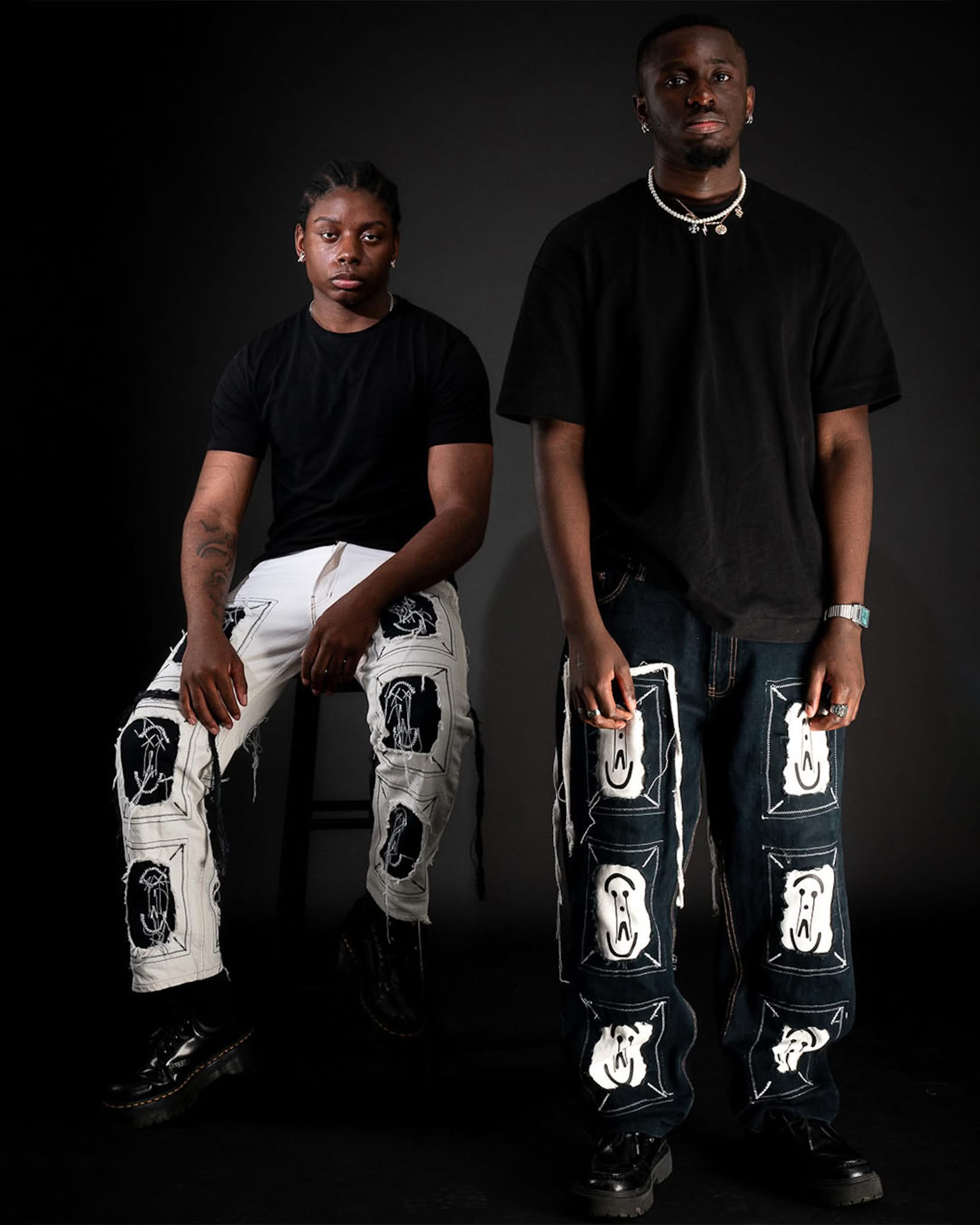 Black & White Framed Logo denim from the DNA Capsule by PrototypesParis, worn by two models.