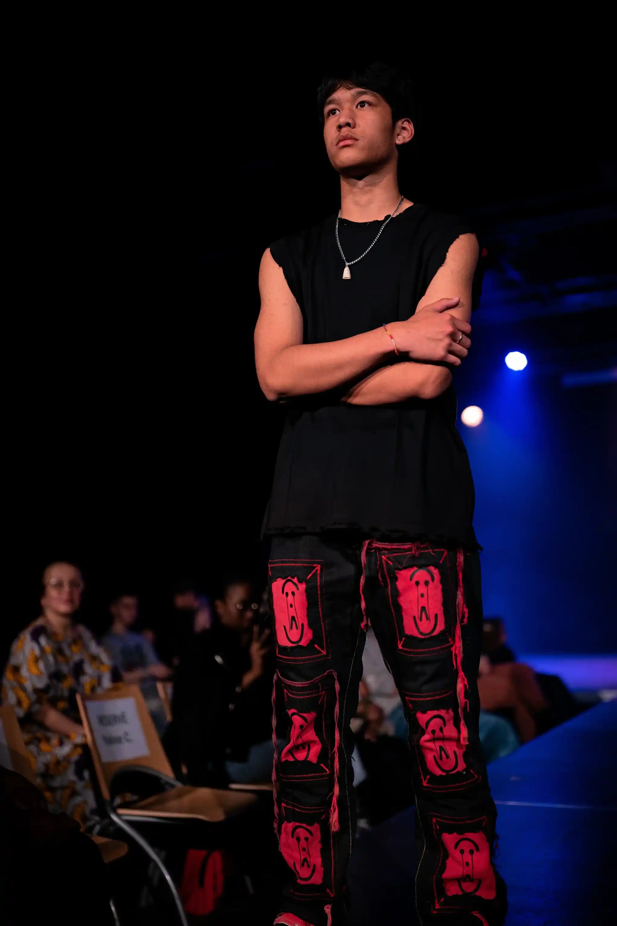 PrototypesParis fashion show: denim with red iconic logo—handcrafted upcycled jeans, front view.