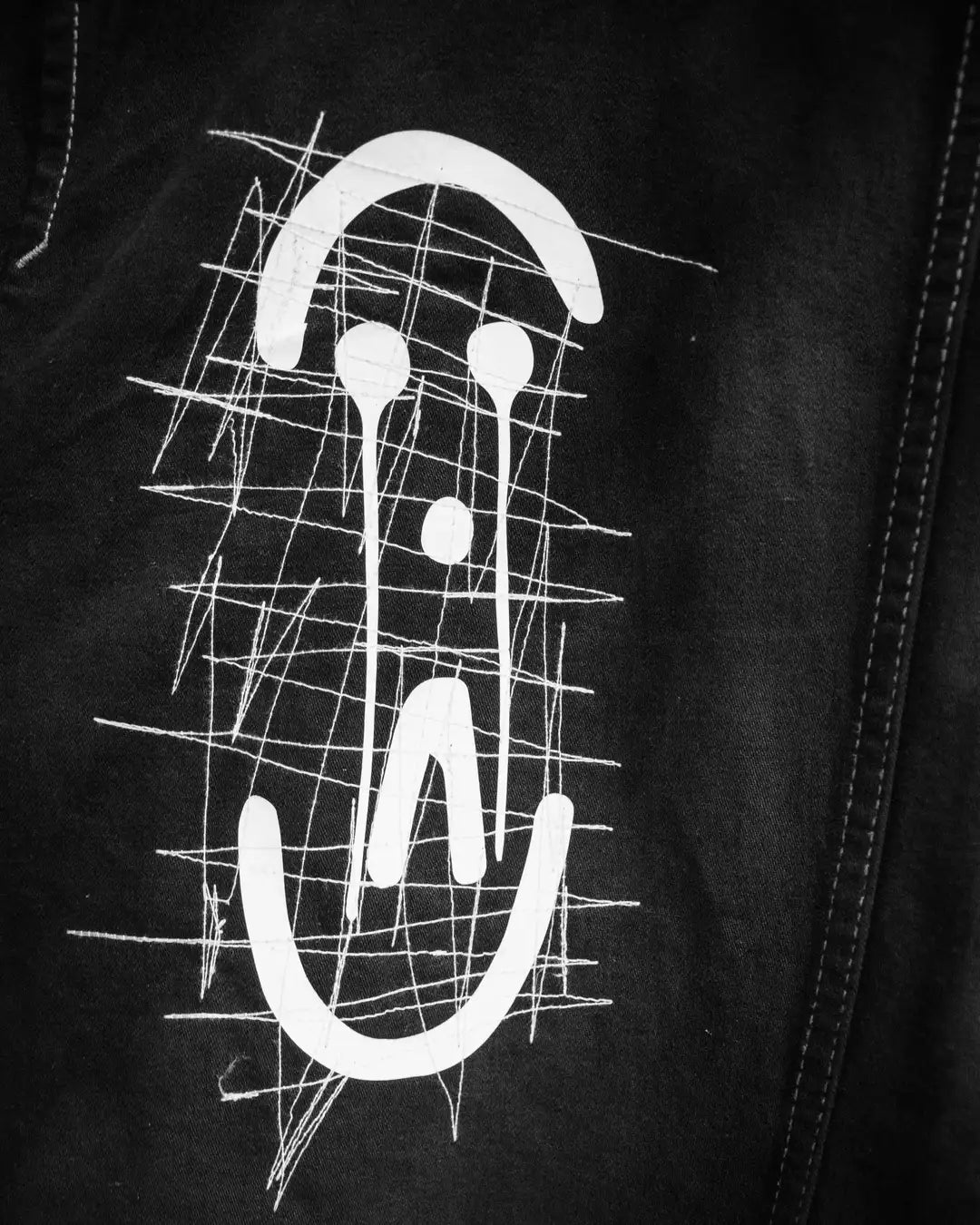 Logo PrototypesParis on a denim trench