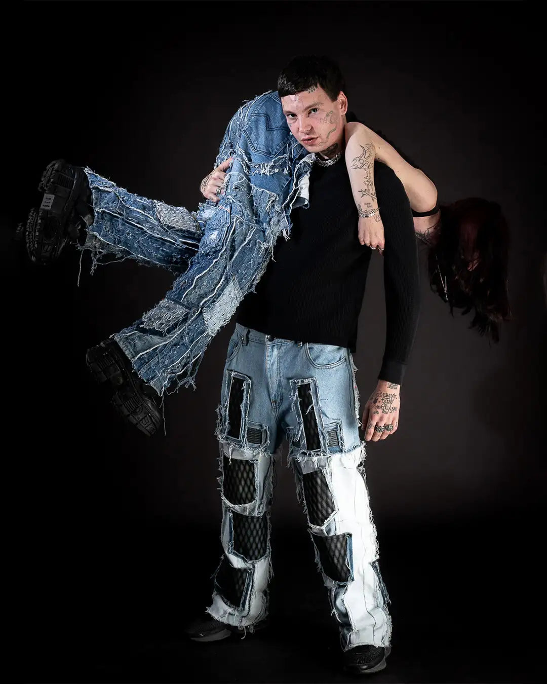 Models wearing Reptilian 3D Printed Denim and Cobalt Shredded Denim by PrototypesParis, featuring printed textures and shr...